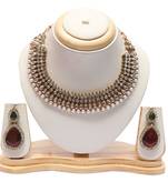 Kundan pearl necklace with green-marron earrings