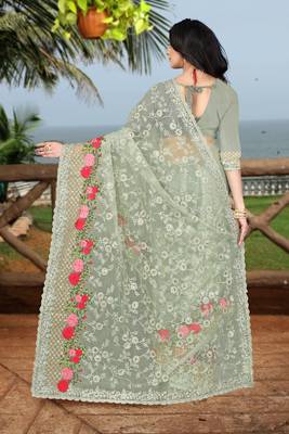 green embroidered net saree with blouse 4