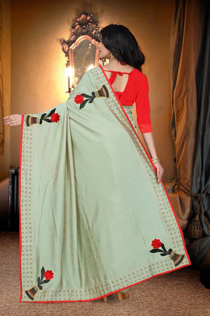green embroidered polyester saree with blouse