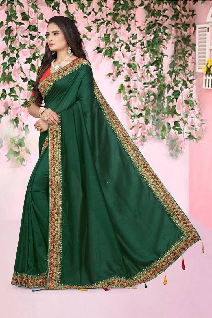 green embroidered polyester saree with blouse