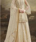 Cream embroidered net salwar