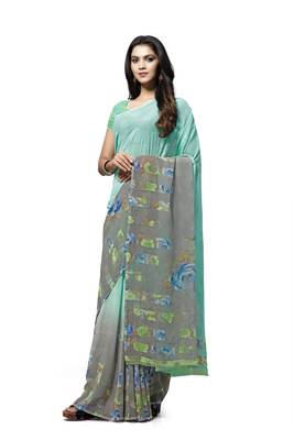 Turquoise printed georgette saree with blouse 1