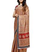 Beige printed tussar silk saree with blouse