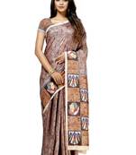 Beige printed tussar silk saree with blouse