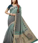 Turquoise printed tussar silk saree with blouse