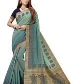 Turquoise printed tussar silk saree with blouse