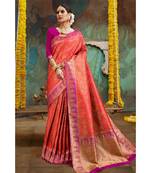 Reddish orange pink woven Banarasi Kataan saree with blouse