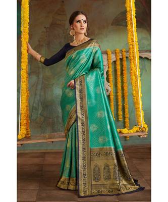 Teal green woven Banarasi Kataan saree with blouse 1
