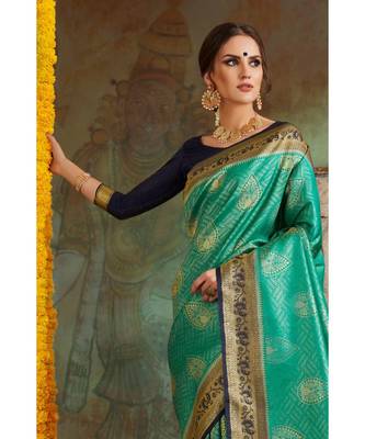 Teal green woven Banarasi Kataan saree with blouse 2