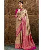 Gold and pink woven Banarasi Kataan saree with blouse