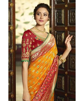 Mustard yellow designer banarasi Patola fusion saree with embroidered silk blouse 1