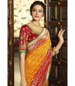 Mustard yellow designer banarasi Patola fusion saree with embroidered silk blouse