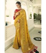 Mustard yellow designer banarasi saree with embroidered silk blouse
