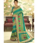 Teal blue designer banarasi patola fusion saree with embroidered silk blouse