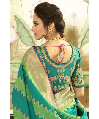 Teal blue designer banarasi patola fusion saree with embroidered silk blouse 2