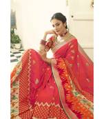 Peach pink designer banarasi patola fusion saree with embroidered silk blouse