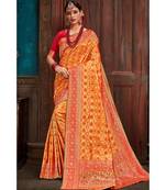Beautiful mango orange red banarasi bandhej fusion saree with blouse