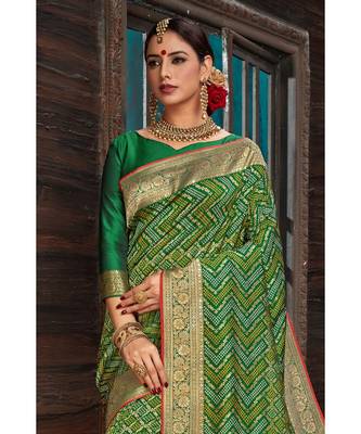Beautiful emerald green banarasi bandhej fusion saree with blouse 3