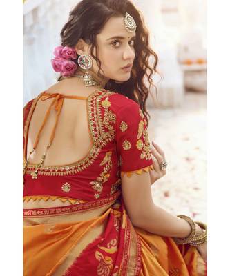 Mustard yellow designer banarasi saree with embroidered silk blouse 2