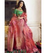 Pink woven designer banarasi saree with embroidered silk blouse