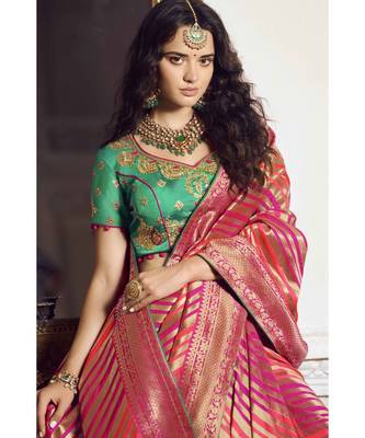 Pink woven designer banarasi saree with embroidered silk blouse 2