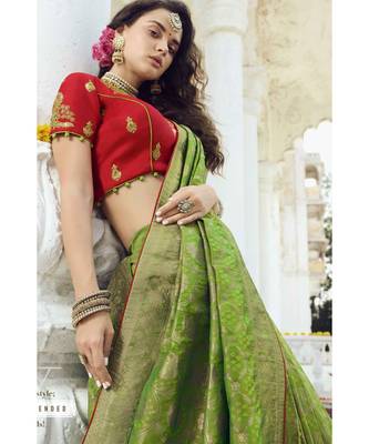 Pastel green woven designer banarasi saree with embroidered silk blouse 1