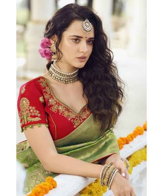 Pastel green woven designer banarasi saree with embroidered silk blouse 2