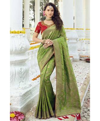 Pastel green woven designer banarasi saree with embroidered silk blouse 3