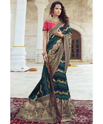 Deep green woven designer banarasi saree with embroidered silk blouse 1