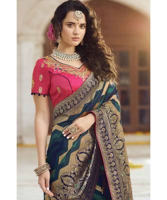 Deep green woven designer banarasi saree with embroidered silk blouse 2