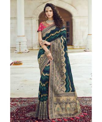 Deep green woven designer banarasi saree with embroidered silk blouse 3