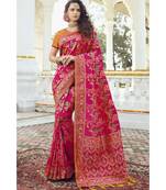 Deep pink floral woven designer banarasi saree with embroidered silk blouse