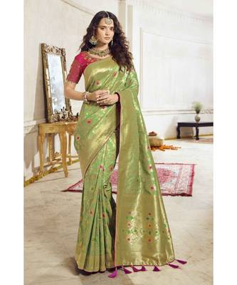 Pastel green woven designer banarasi saree with embroidered silk blouse 1