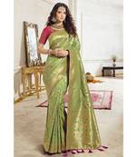 Pastel green woven designer banarasi saree with embroidered silk blouse