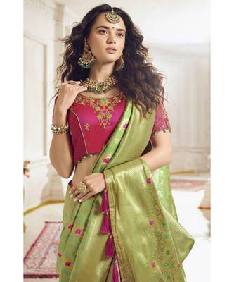 Pastel green woven designer banarasi saree with embroidered silk blouse 2