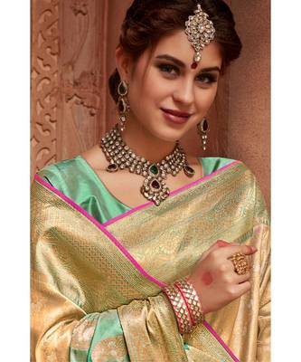 Golden beige woven tissue kanjivaram saree with blouse 3