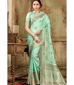 Pastel green woven kanjivaram saree with blouse