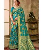 Blue green woven kanjivaram saree with blouse