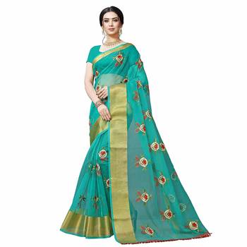 green embroidered organza saree with blouse 1