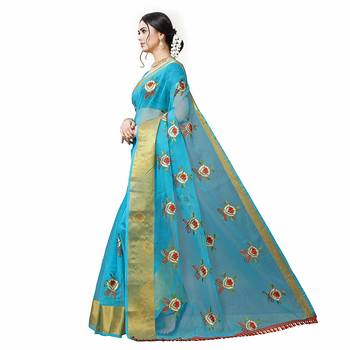 turquoise embroidered organza saree with blouse 1