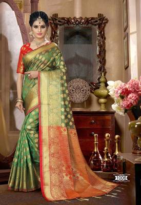 Green woven silk blend saree with blouse 1