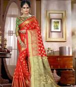 Orange woven silk blend saree with blouse
