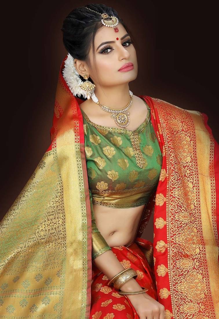 Orange woven silk blend saree with blouse