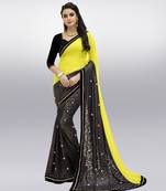 yellow embroidered georgette saree with blouse