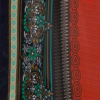 Orange printed georgette saree with blouse 6