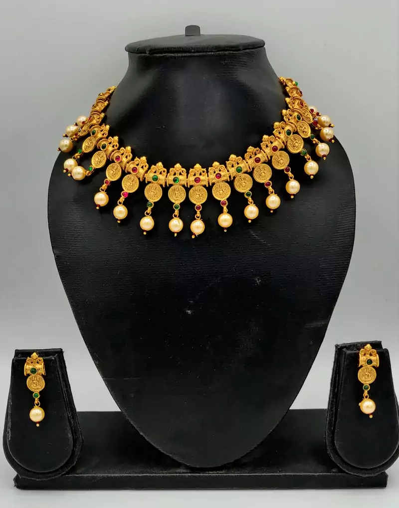 Women Gold-Plated Pink & Green Stone Studded Handcrafted Temple Jewellery Set