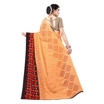 Orange printed georgette saree with blouse 3