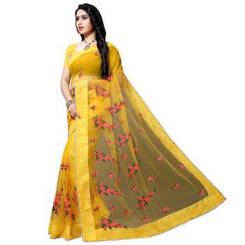 Yellow printed net saree with blouse 2