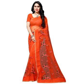 Orange printed net saree with blouse 1
