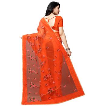 Orange printed net saree with blouse 3